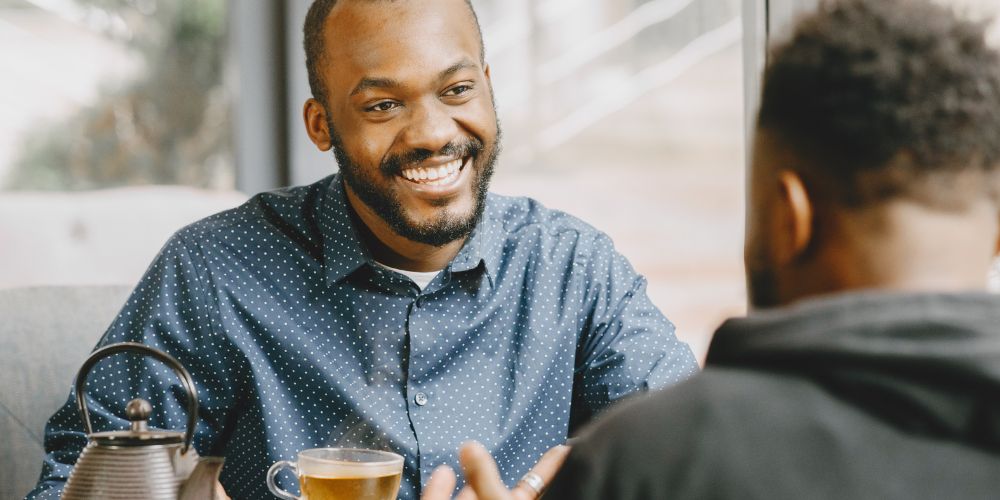 Two men talking