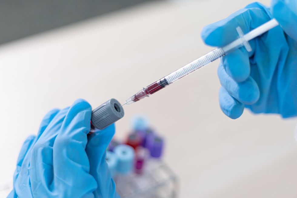 Genetic Testing A blood sample being collected