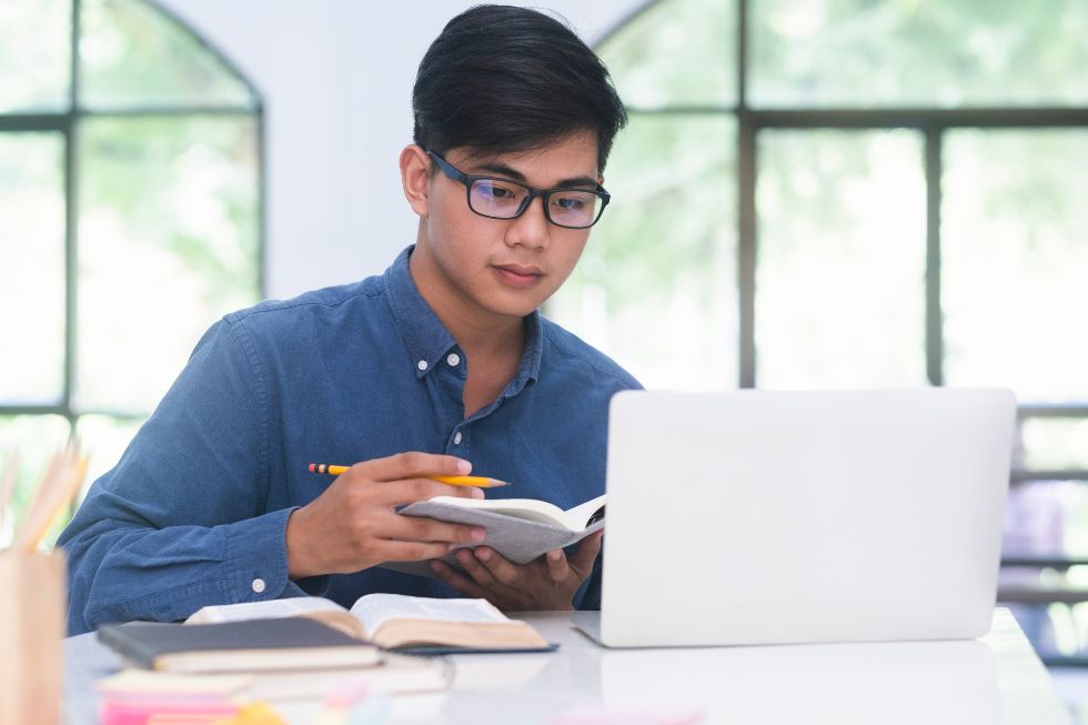 Man researching Man doing research